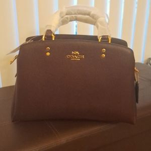 Coach handbag (New with tag).